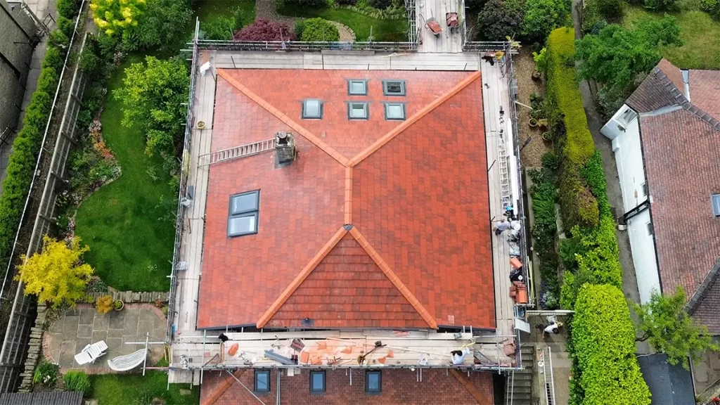 Drone shot of re-roof with complex access